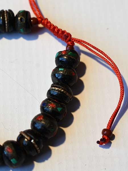 Black inlay bone wrist mala