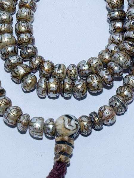 Carved Om Mani pearl mala