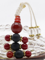 Black inlaid bone mala with 108 beads.