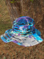 Tie-dye hat in bohemian style with razor cut and patch flowers