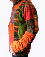 Wholesale razor-cut patchwork cotton hoodie handmade in Nepal featuring horizontal multi-coloured ribbed texture panels, a wooden button front, and a side pocket.