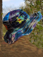 Tie-dye hat in bohemian style with razor cut and patch flowers