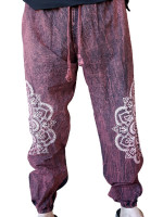 Wholesale stonewashed mandala festival pants in a maroon mineral wash, featuring large white hand-printed mandalas, 100% cotton fabric, and elasticated cuffs.